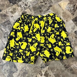 4/30$ Pokémon « pikachu » Yellow and Black Graphic swim short 6 years